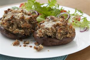 Flat Mushrooms stuffed with Sausage Meat and Garlic Butter